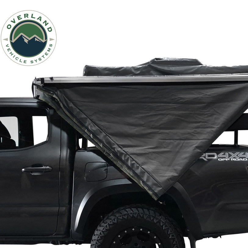 Overland Vehicle Systems Nomadic Awning 180 - Dark Gray Cover With Black Transit Side Cover View